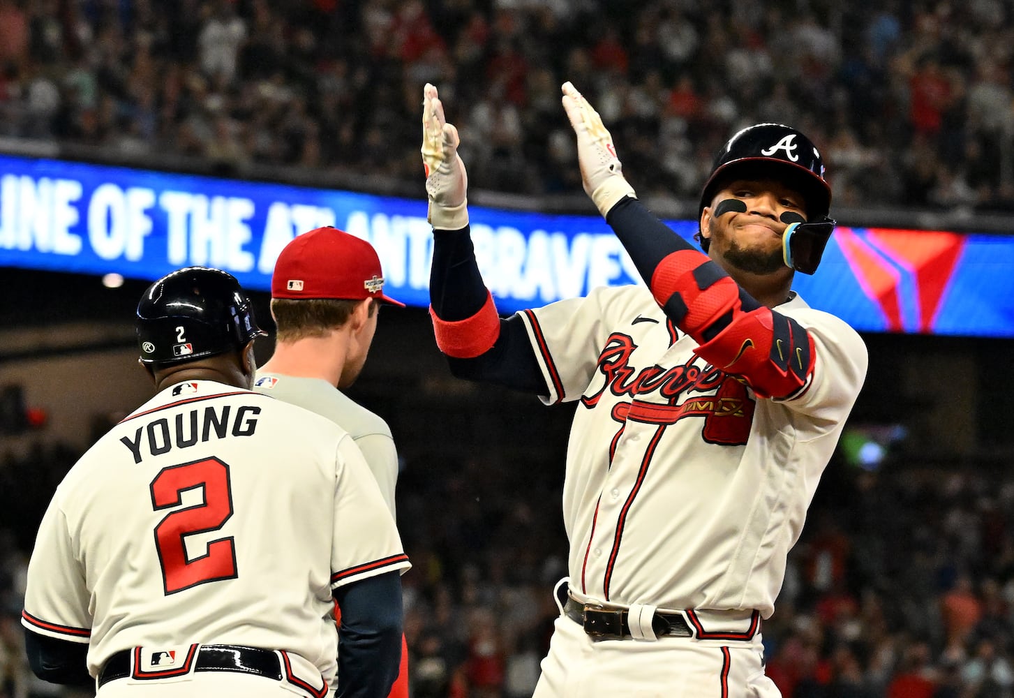 Atlanta Braves’ Ronald Acuna (13) singles against the Philadelphia Phillies during the fourth inning of game two of the National League Division Series at Truist Park in Atlanta on Wednesday, October 12, 2022. (Hyosub Shin / Hyosub.Shin@ajc.com)