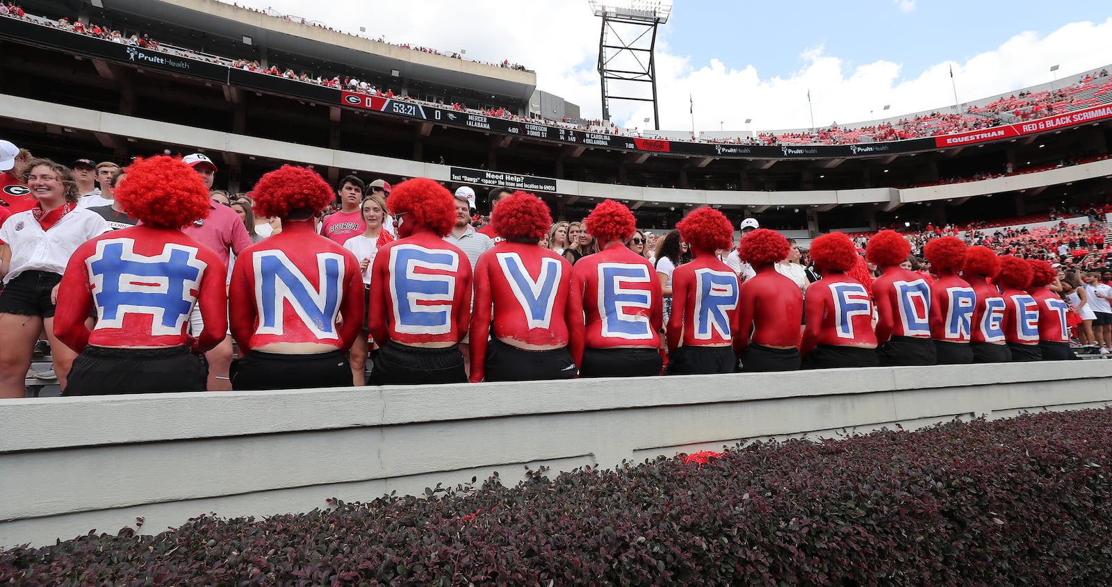 Georgia students pay tribute to 9/11 bearing the letters "#NEVER FORGET" with fans returning for a capacity crowd against UAB Saturday, Sept. 11, 2021, in Athens. (Curtis Compton / Curtis.Compton@ajc.com)