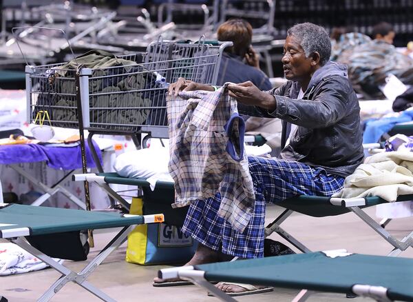 September 10, 2017 Albany: A elderly man drys out his clothes preparing to bed down for the night at the Red Cross shelter in the Albany Civic Center to ride out Hurricane Irma on Sunday, September 10, 2017, in Albany.