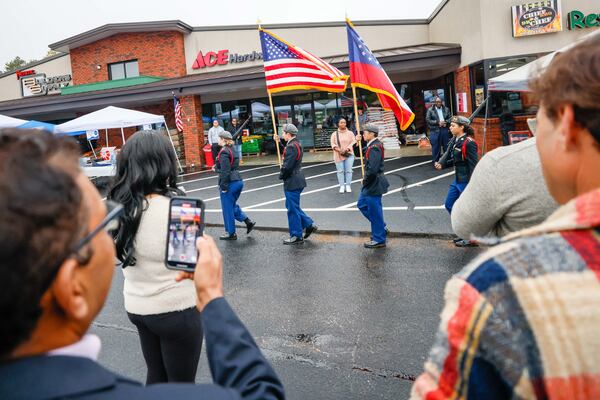 Members of the JORTC program at Grayson High School presented the flag to the guests during the 3rd Annual Veterans Day celebration at the ACE Hardware parking lot on Sunday, Nov. 10, 2024, in Lawrenceville.
(Miguel Martinez / AJC)