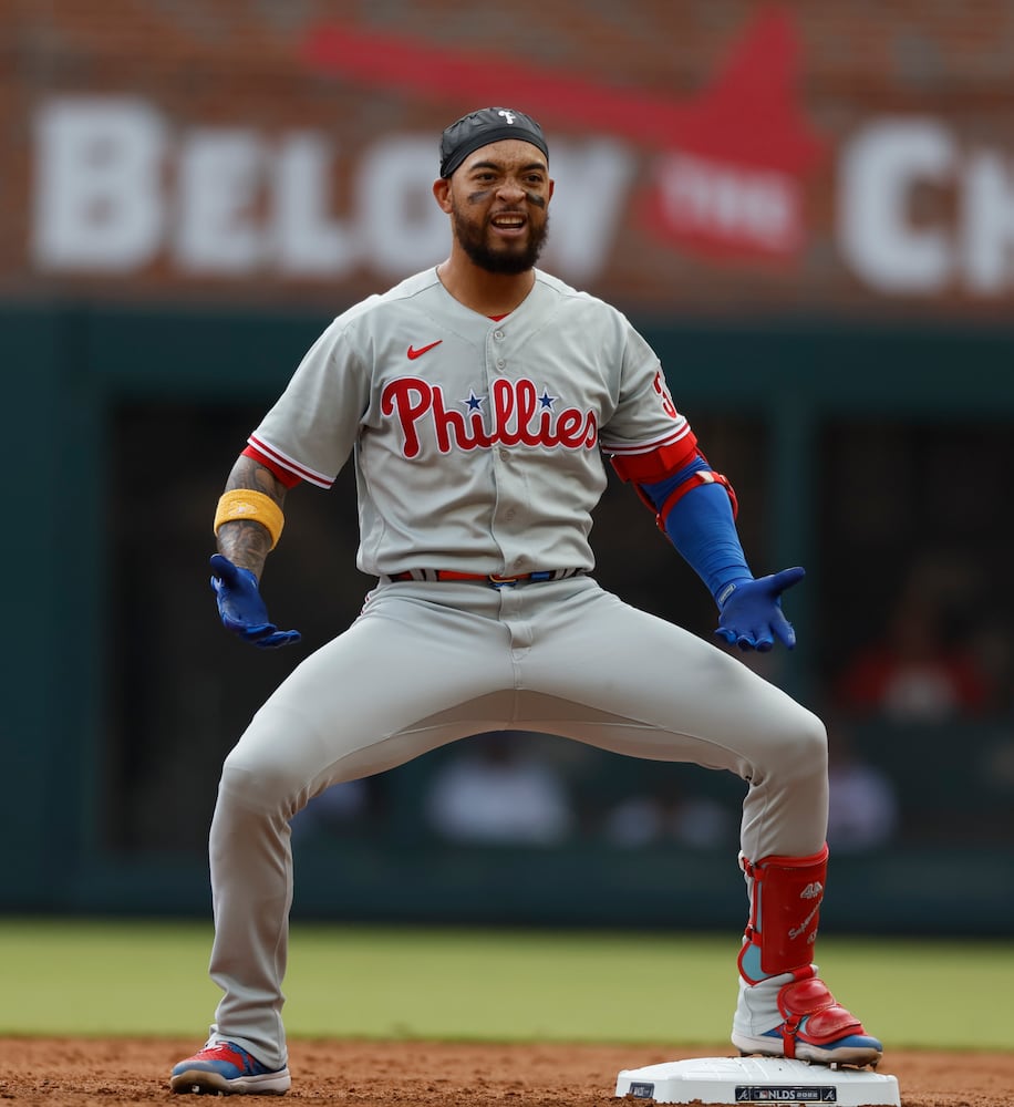 Philadelphia Phillies' Edmundo Sosa reacts after hitting a double during the second inning of game one of the baseball playoff series between the Braves and the Phillies at Truist Park in Atlanta on Tuesday, October 11, 2022. (Jason Getz / Jason.Getz@ajc.com)