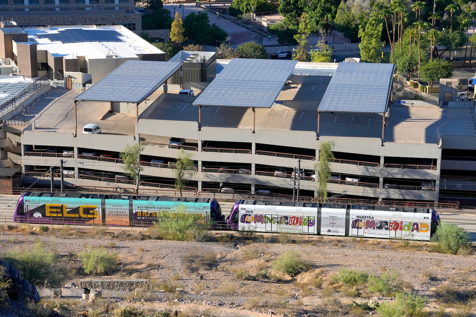 A Valley Metro Rail train moves through Tempe, Ariz., Tuesday, Sept. 24, 2024. (AP Photo/Ross D. Franklin)