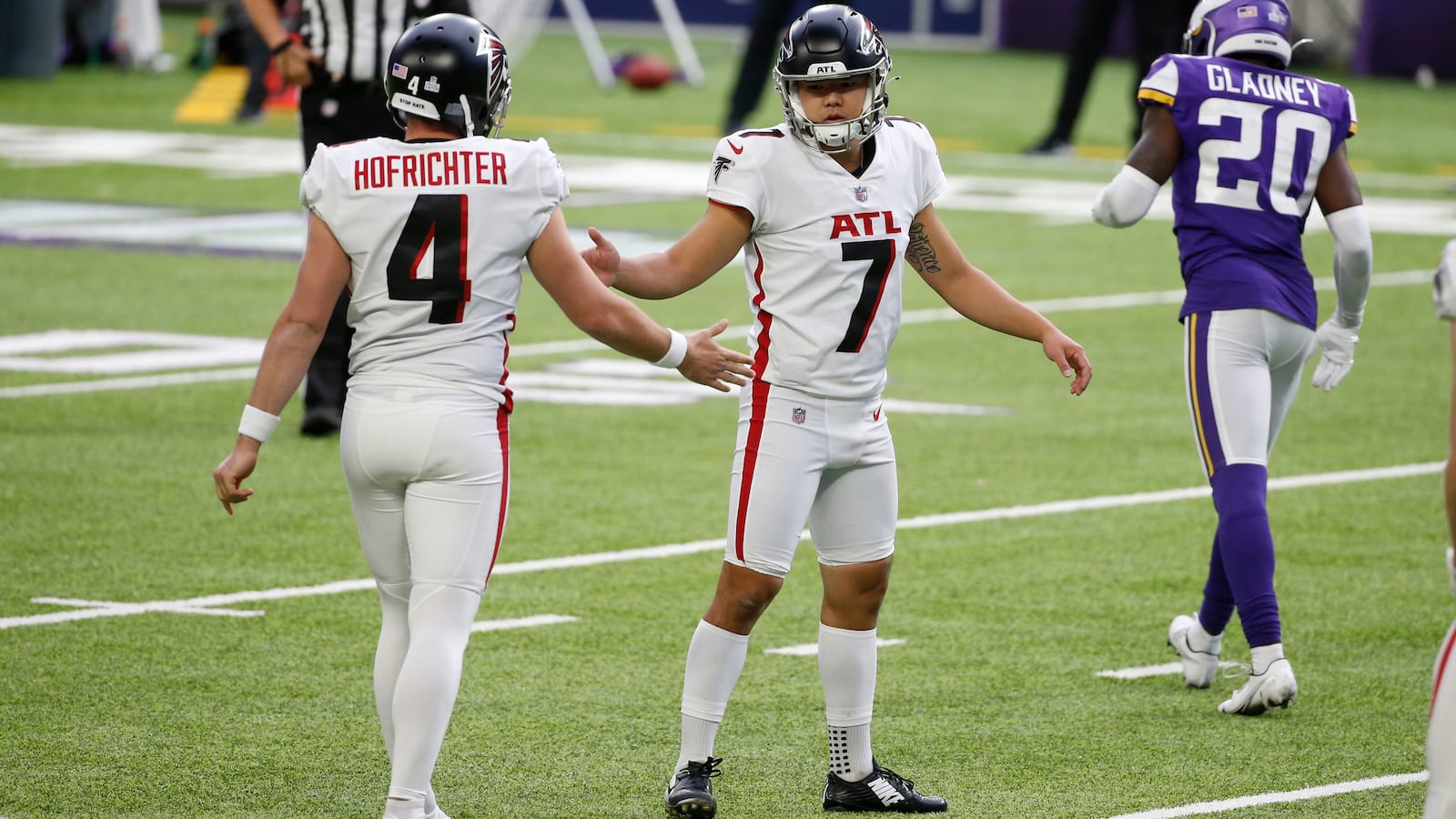 Atlanta Falcons kicker Younghoe Koo (7) celebrates his 21-yard field goal with Sterling Hofrichter (4) against the Minnesota Vikings, Sunday, Oct. 18, 2020, in Minneapolis. (Bruce Kluckhohn/AP)