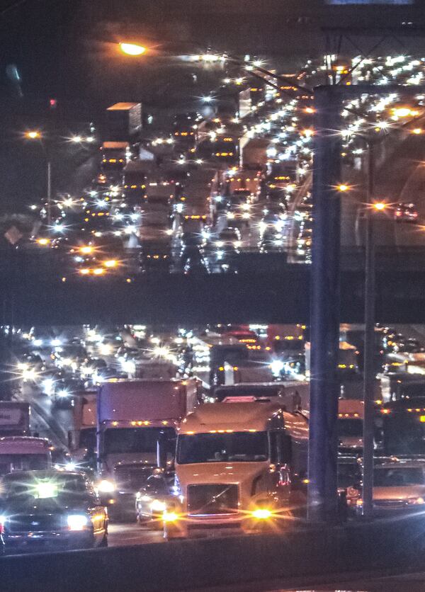 Traffic was backed up for miles Friday after police shut down the northbound Downtown Connector to investigate a deadly shooting.