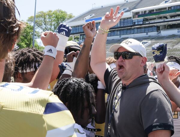 Georgia Tech coach Brent Key huddles with players at last year's spring game.