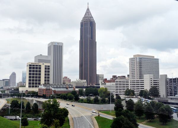 The AT&T building (tallest building to the left of the Bank of America building) has lost its AT&T logo, replaced by a logo for the building's new name, Tower Square. Photographed Wednesday, September 16, 2009. Bita Honarvar, bhonarvar@ajc.com