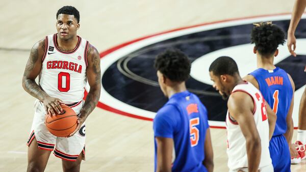 Georgia guard K.D. Johnson (0) prepares to shoot a free throw during a game against Florida Saturday, Jan. 23, 2021, at Stegeman Coliseum in Athens. (Tony Walsh/UGA Sports)