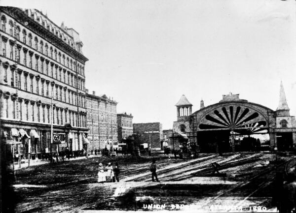 Circa 1880: Union Station, with its distinctive fan-shaped center arch, is seen next to the original Kimball House at left. (Tracy O'Neal Collection at GSU Library N02-21_01)