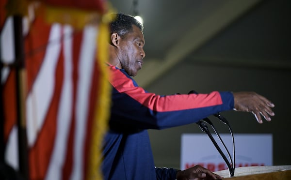 Republican U.S. Senate candidate Herschel Walker speaks to supporters during a campaign rally at The Mill on Etowah Thursday, Nov. 10, 2022. (Daniel Varnado/For the AJC)