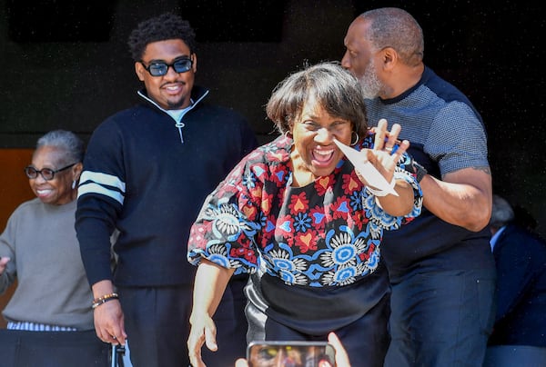 Karla Redding-Andrews, daughter of soul legend Otis Redding, greets spectators at Tuesday's ribbon cutting in downtown Macon for the Otis Redding Center for the Arts. (Jason Vorhees / The Macon Melody newspaper)