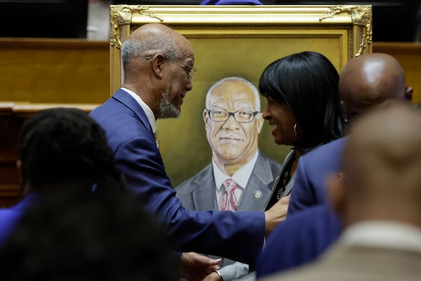 In 2022, state Rep. Calvin Smyre, a Columbus Democrat, was greeted by lawmakers after a portrait of him was unveiled on the House floor. Another ceremony was held Tuesday at the Capitol for the now retired lawmaker.