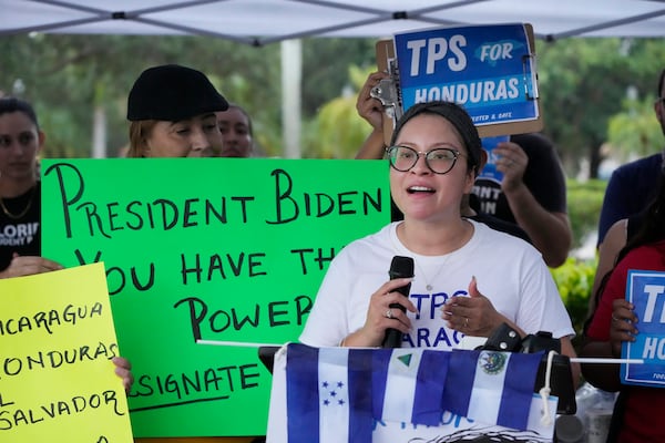 FILE - Yareliz Mendez, 29, with the Florida Immigrant Coalition, speaks during a news conference calling for a new designation of Temporary Protected Status (TPS) for migrants from Nicaragua, El Salvador, and Honduras, in front of the Immigration and Customs Enforcement (ICE) offices, Wednesday, July 26, 2023, in Miramar, Fla. (AP Photo/Wilfredo Lee, File)