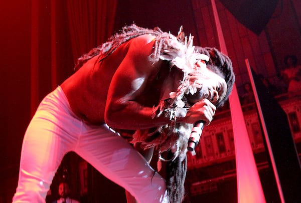 Deep Cotton's Nate "Rocket" Wonder leans a little closer to fans at the Tabernacle during the band's performance of "Let's Get Caught." Photo: Ryon Horne/AJC.