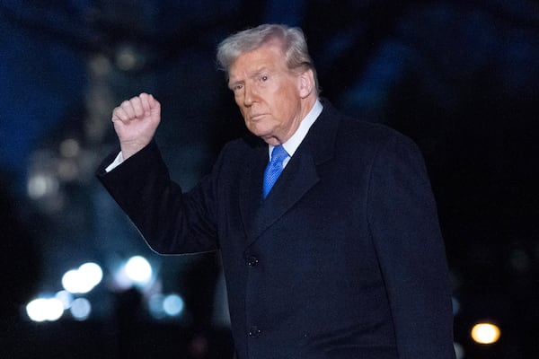 President Donald Trump waves to the media as he walks on South Lawn of the White House, in Washington, Sunday, March 9, 2025. (AP Photo/Jose Luis Magana)