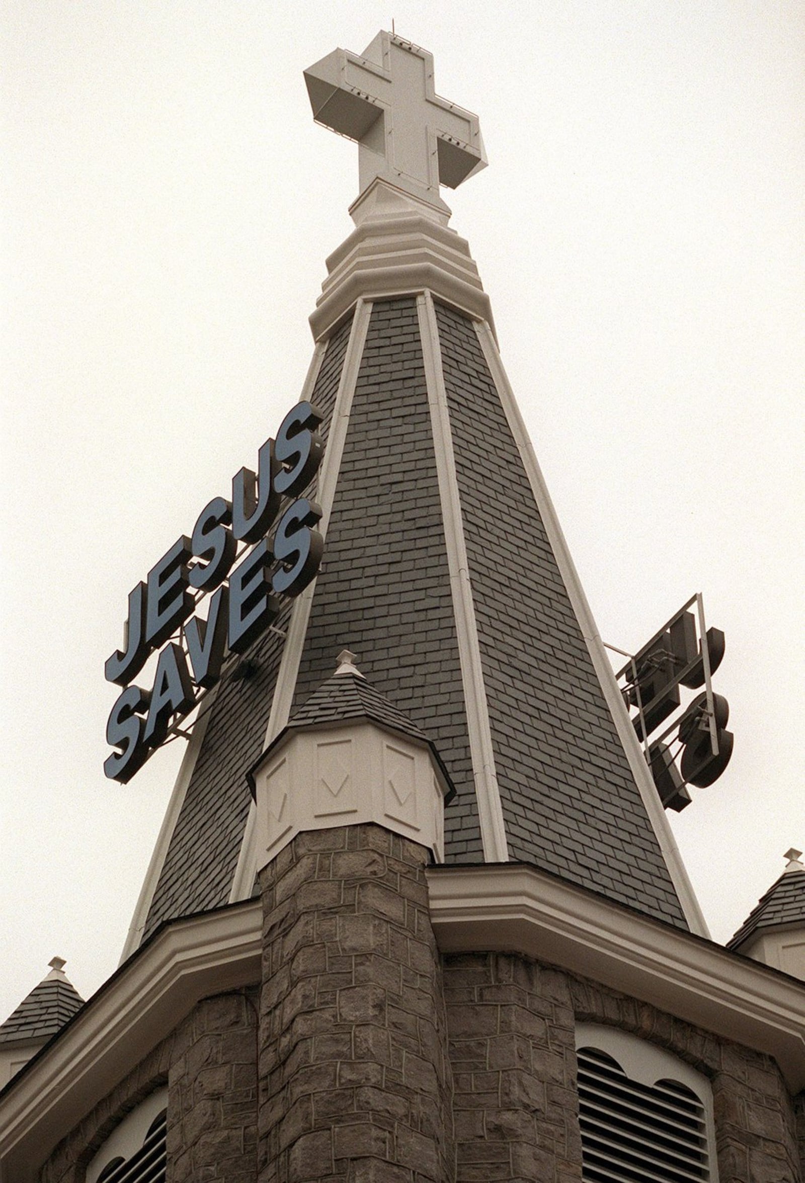 ATLANTA, GA — The ‘Jesus Saves’ sign on the steeple of Big Bethel AME Church on Auburn Avenue has been unlit for a decade. The church is throwing a celebration for the relighting of the sign. (DWIGHT ROSS, JR./AJC staff)