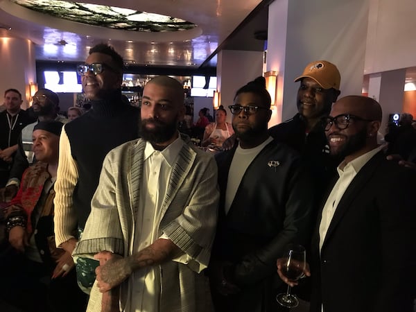  (L-R) Stanley Hudson, Fabio Costa, Anthony Williams, Miss Sophia of V-103 and Ken Lawrence watch their collections roll out on screen. "I have more than enough weave in my hair!" Anthony excliamed. CREDIT: Rodney Ho/rho@ajc.com