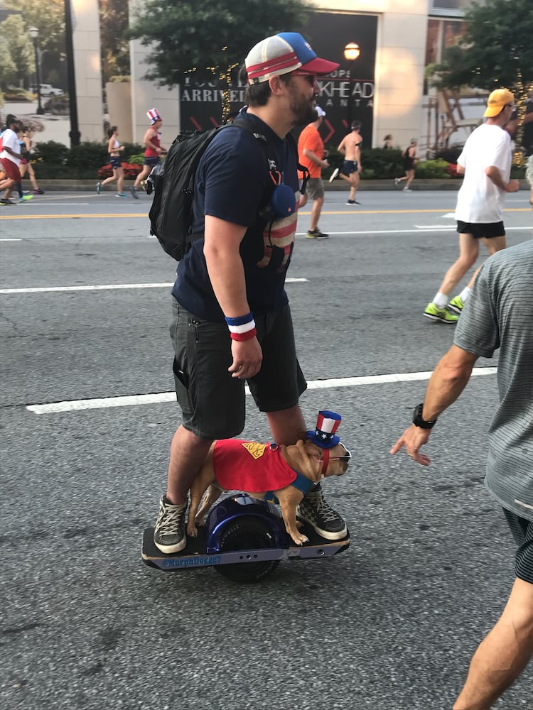 Runners show fashion flair during AJC Peachtree Road Race