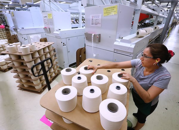  Rachel Valdez stacks palets of finished yawn at Buhler  Yarns  on Monday, March 11, 2019, in Jefferson. Curtis Compton/ccompton@ajc.com