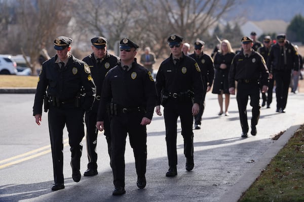 Slain West York Borough Police Officer Andrew Duarte's funeral procession departs from Living Word Community Church, in Red Lion, Pa., Friday, Feb. 28, 2025. (AP Photo/Matt Rourke)