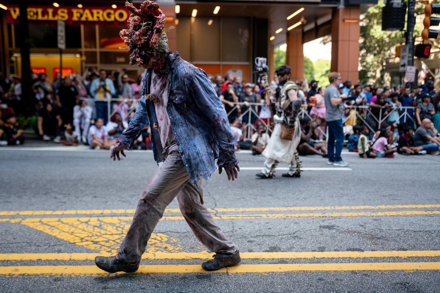 Thousands lined up along Peachtree Street Saturday morning for the annual Dragon Con parade.