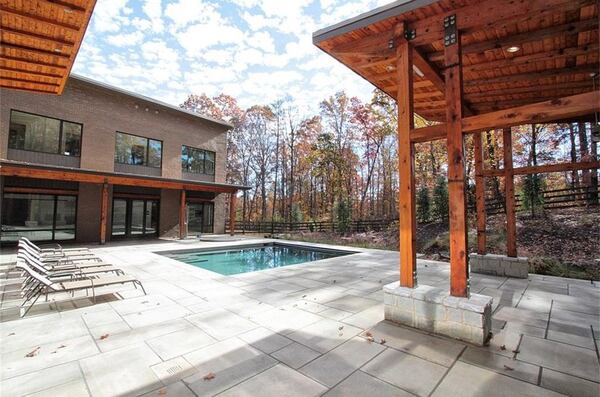 This modern estate at 4056 Hog Mountain Road in Hoschton is listed for $2.195 million. (Photos via zillow.com)