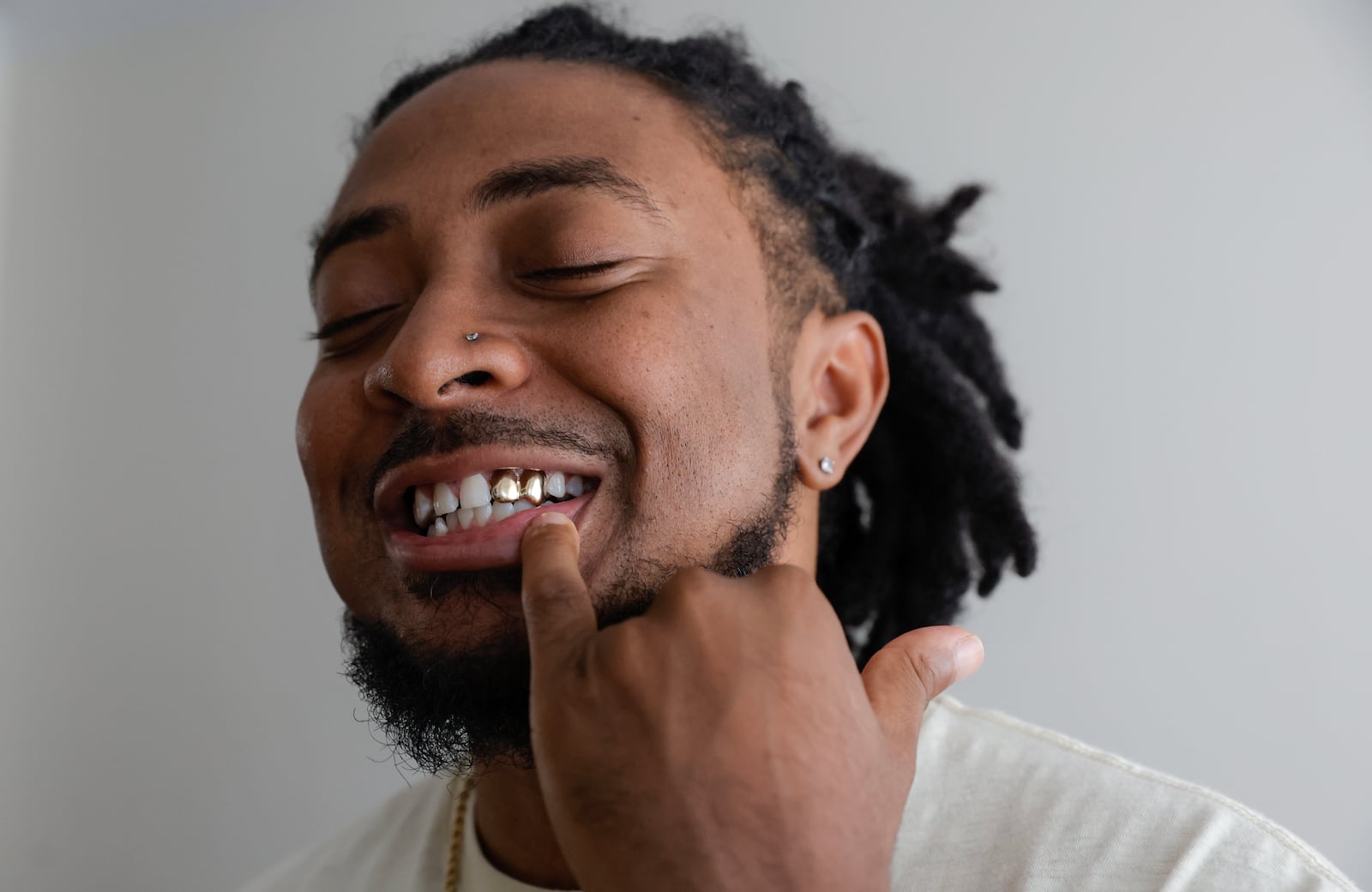 Atlanta rapper Deante Hitchcock poses for a portrait at his home in Decatur on Friday, April 28, 2023.  (Natrice Miller/natrice.miller@ajc.com)