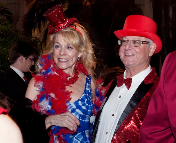 Ann Corwell, of Palm Beach Gardens and Steve Feiertag, of Royal Palm Beach, attend A Red, White and Blue Celebration honoring the first anniversary of Donald Trump's inauguration at Mar-a-Lago Club January 18, 2018 in Palm Beach . (Meghan McCarthy/ The Palm Beach Post)