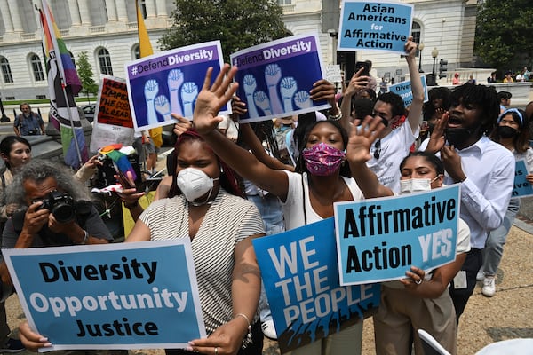 
                        Demonstrators react to the affirmative action opinion outside the U.S. Supreme Court in Washington, June 29, 2023. The Supreme Court on Thursday ruled that the race-conscious admissions programs at Harvard and the University of North Carolina were unlawful, curtailing affirmative action at colleges and universities around the nation, a policy that has long been a pillar of higher education. (Kenny Holston/The New York Times)
                      