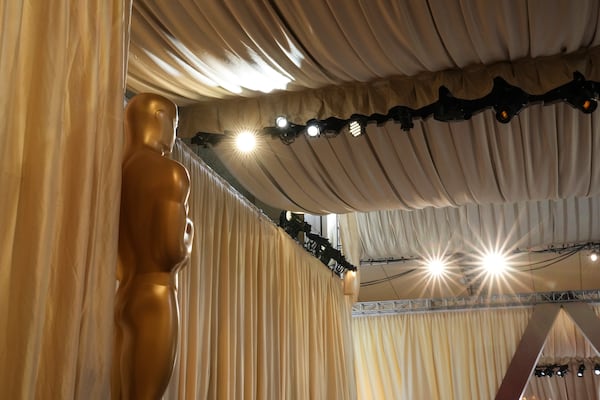 An Oscar statue stands in the red carpet area before the 97th Academy Awards in Los Angeles, Saturday, March 1, 2025. (AP Photo/Jae C. Hong)