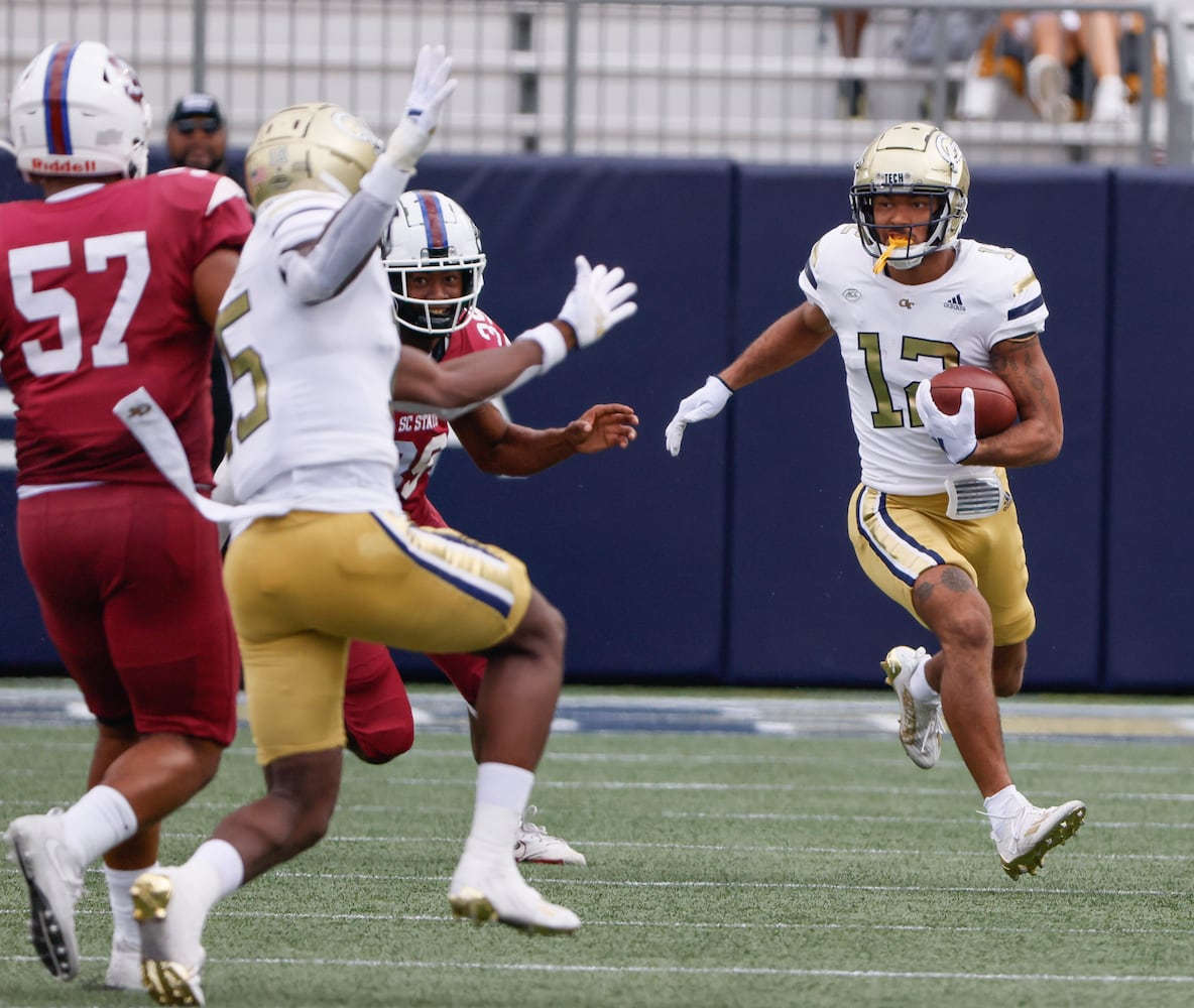 Georgia Tech Yellow Jackets wide receiver Dominick Blaylock (12) returns a punt in the first half during a football game against South Carolina State at Bobby Dodd Stadium in Atlanta on Saturday, September 9, 2023.   (Bob Andres for the Atlanta Journal Constitution)