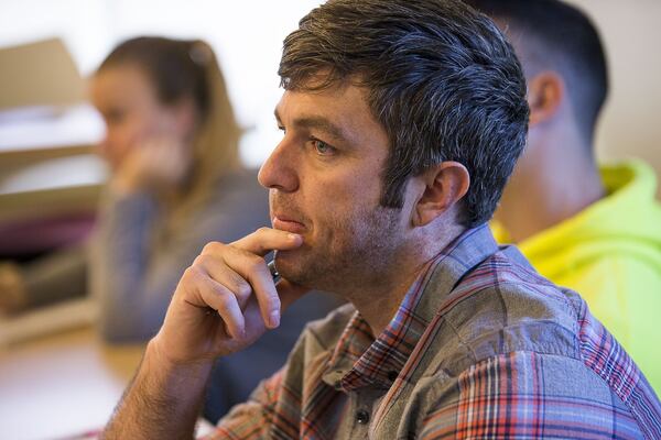 U.S. Army veteran Chris Weakley follows along in his French 101 class at the Emory University main campus in Atlanta on Oct. 28, 2019. Weakley had a 12-year Army career. ALYSSA POINTER / ALYSSA.POINTER@AJC.COM