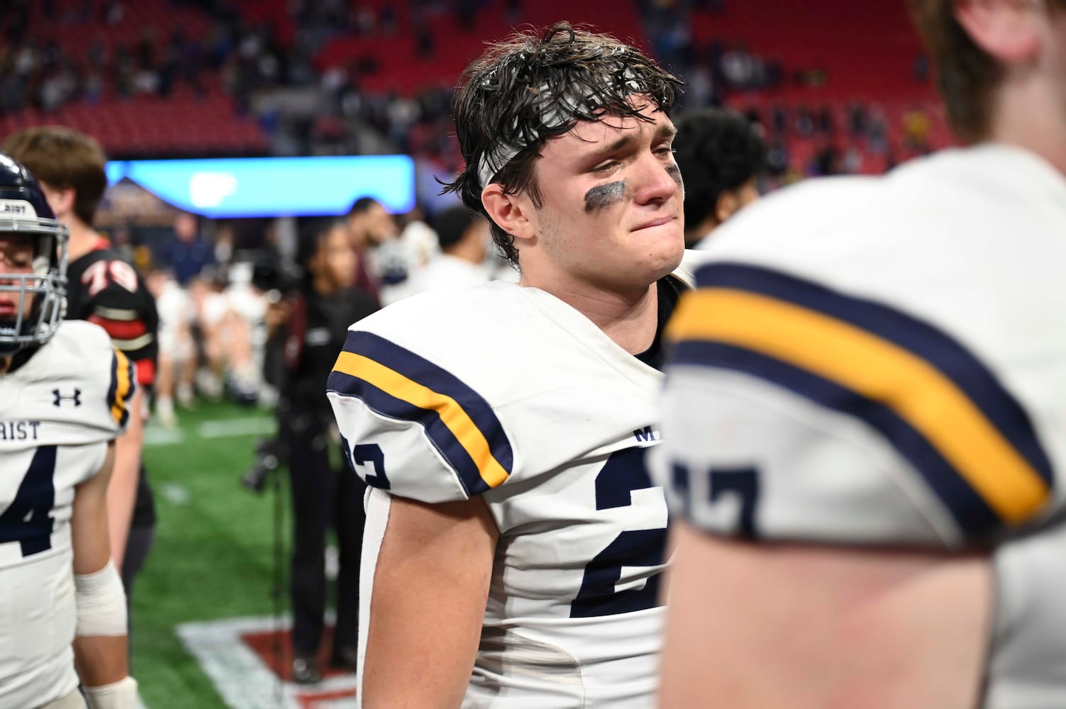 Marist’s Noah Gerrick (24) becomes emotional after losing to North Oconee during a Class 4A championship game at the Mercedes-Benz Stadium Monday, Dec. 16, 2024. (Photo/Daniel Varnado)