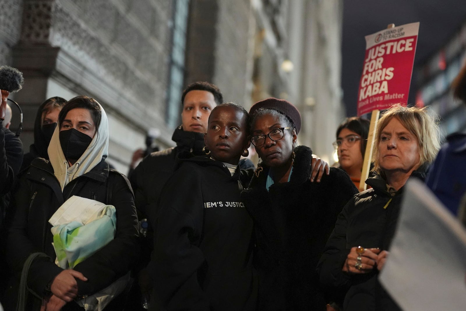 People demonstrate outside the Old Bailey in central London, Monday Oct. 21, 2024, after the London police officer who fatally shot Chris Kaba was acquitted of murder. (Jordan Pettitt/PA via AP)