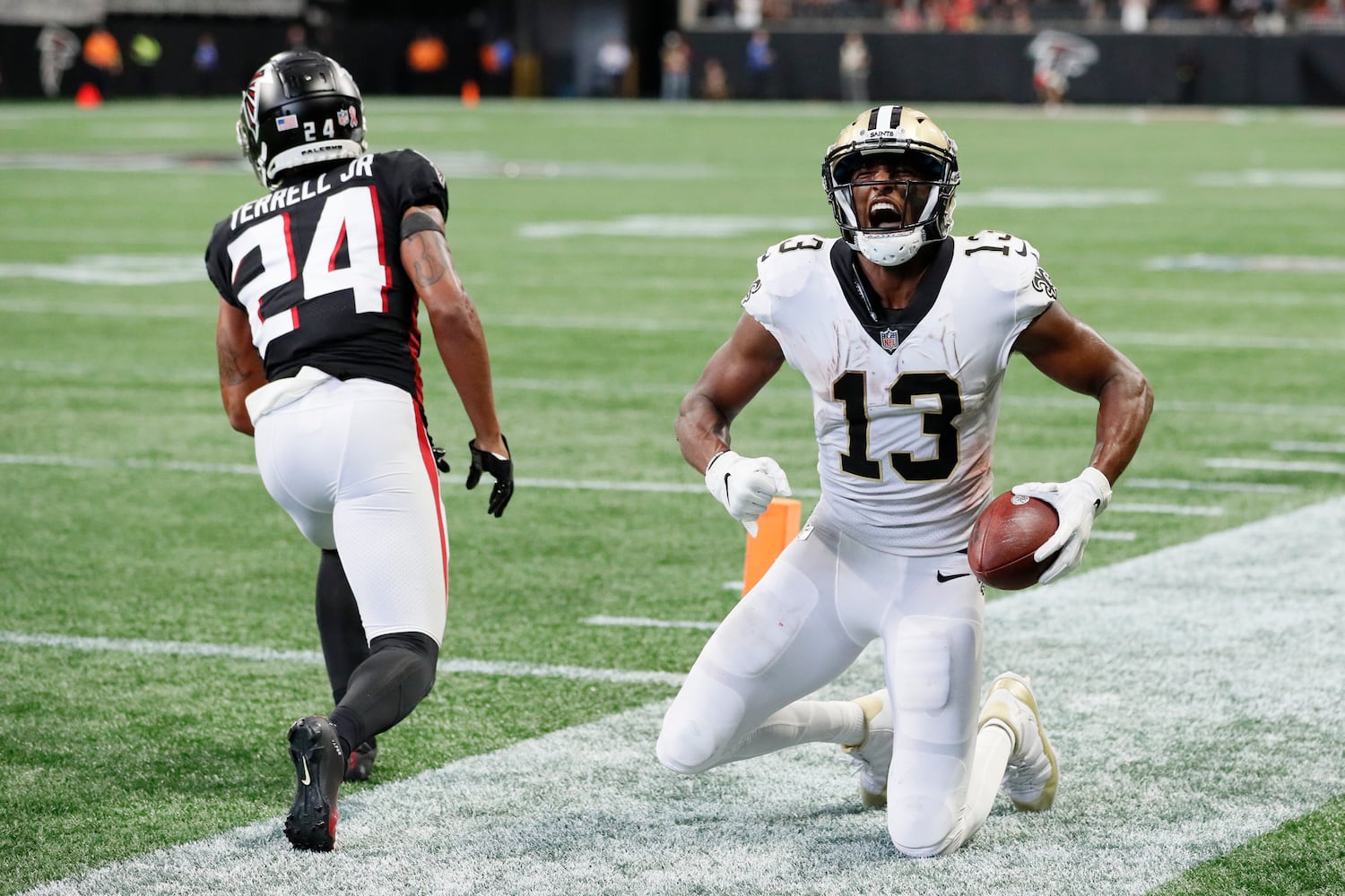 Saints wide receiver Michael Thomas reacts after scoring a touchdown in the fourth quarter on Sunday. (Miguel Martinez / miguel.martinezjimenez@ajc.com)