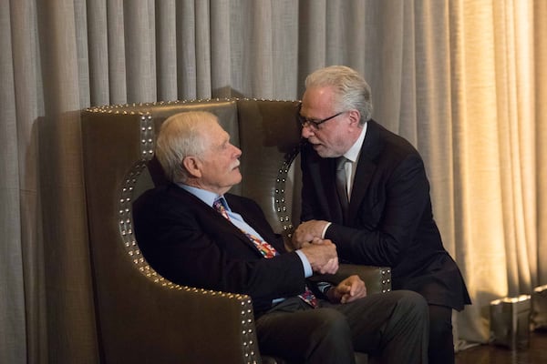 Ted Turner talks with CNN anchor Wolf Blitzer during Turner's 80th birthday party at the St. Regis Atlanta hotel on Saturday, Nov. 17, 2018. Turner was the founder of CNN, the first 24-hour news network. (Photo: BRANDEN CAMP/SPECIAL TO THE AJC)