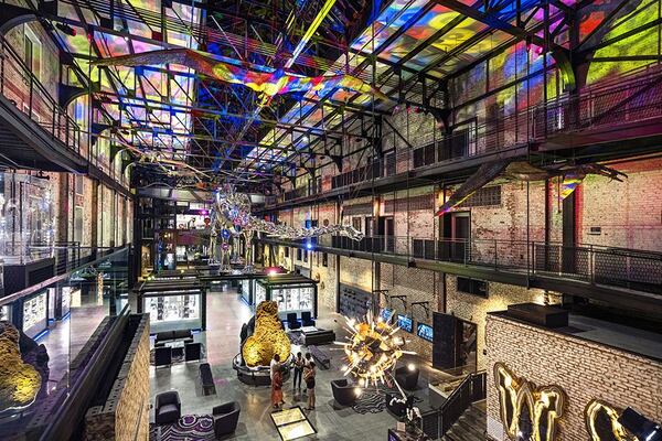 The lobby of the J.W. Marriott Plant Riverside District includes a chrome-plated dinosaur skeleton and other natural history artifacts. The $400 million project opened in 2020. (photo courtesy of The Kessler Collection)