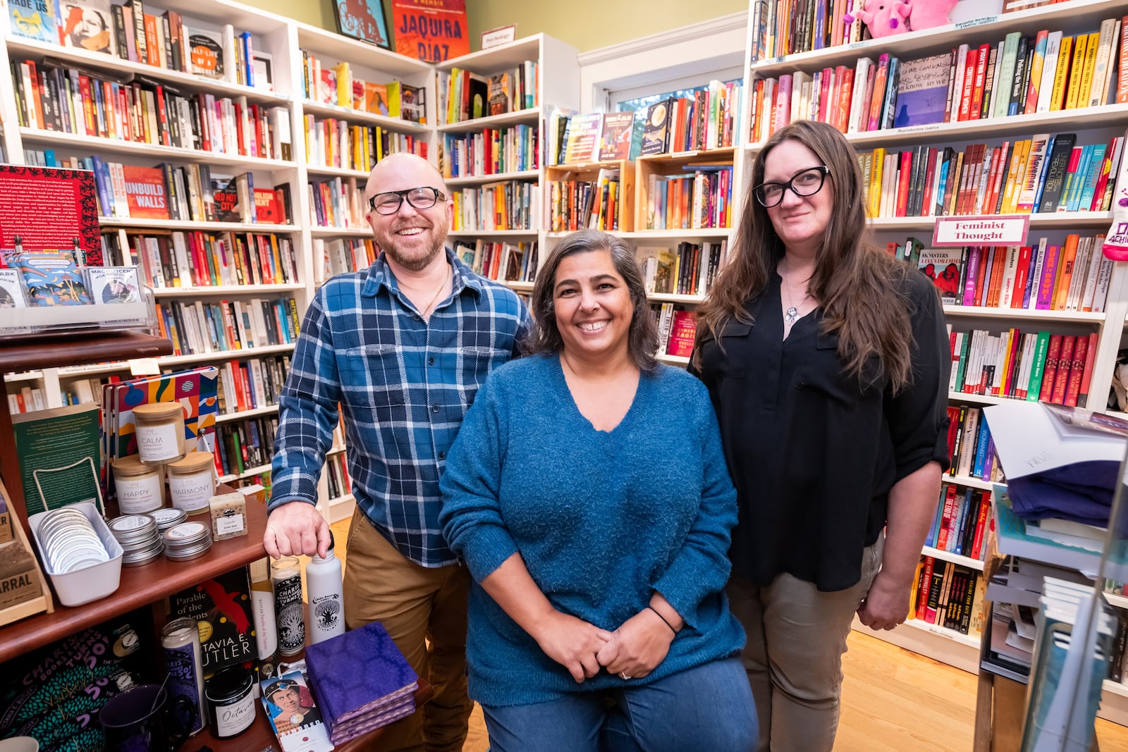 E.R. Anderson, executive director of Charis Circle (from left), joins Charis Books & More co-owners Angela Gabriel and Sara Luce Look in the store. 
(Bita Honarvar for The Atlanta Journal-Constitution)