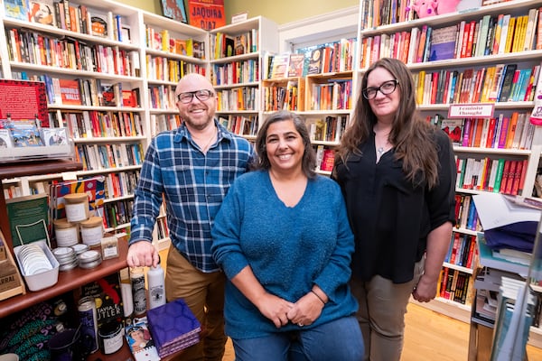 E.R. Anderson, executive director of Charis Circle (from left), joins Charis Books & More co-owners Angela Gabriel and Sara Luce Look in the store. 
(Bita Honarvar for The Atlanta Journal-Constitution)