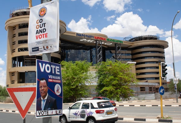 Elections poster of poles in Windhoek, Namibia, Sunday, Nov. 24, 2024 ahead of elections Wednesday, Nov. 27, 2024. (AP Photo/Esther Mbathera)