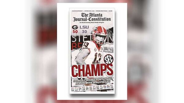 Atlanta Journal-Constitution ePaper bonus coverage of Georgia Bulldogs becoming SEC champions.