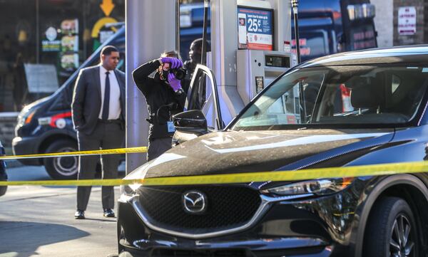 Atlanta police investigated a shooting at a gas station near Mercedes-Benz Stadium on Feb. 1.

