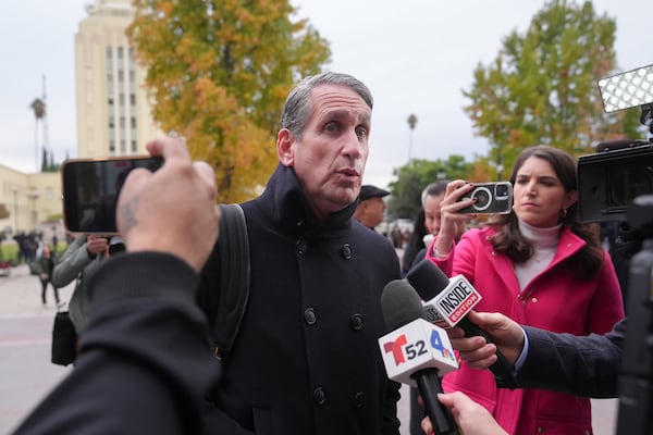 Bryan Freedman, an attorney representing family members of Erik and Lyle Menendez, talks to reporters outside a courthouse in Los Angeles, Monday, Nov. 25, 2024. (AP Photo/Jae C. Hong)