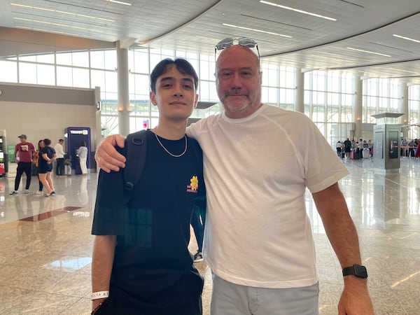 Steven Blesi, left, with his father, Steve Blesi, at Atlanta Hartfield Jackson International Airport. Blesi said his son had wanted to go study abroad in South Korea for years.