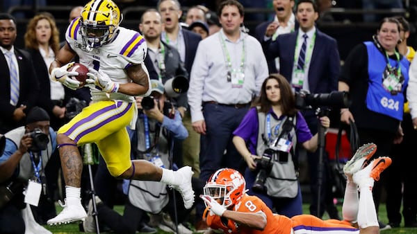 LSU wide receiver Ja'Marr Chase scores past Clemson cornerback A.J. Terrell in the first half in the college football playoff national championship game in 2020. (AP Photo/Sue Ogrocki)