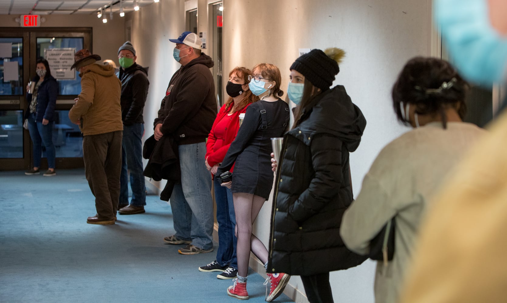 Voters wait in like at the Dunwoody Library as they polls opened at 7am on election day Nov 3rd, 2020. PHIL SKINNER FOR THE ATANTA JOURNAL-CONSTITUTION