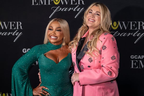 GCAPP EmPower Party 2024 attendee Phaedra Parks (left) stands with emcee Heather McMahan on Nov. 14 at the Egyptian Ballroom at the Fox Theatre. (Courtesy of Cindy Lucas-Stone)