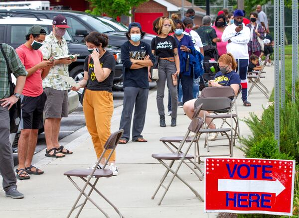 Voters wait in a long line that stretched around the Metropolitan Library Tuesday, June 9, 2020.  STEVE SCHAEFER FOR THE ATLANTA JOURNAL-CONSTITUTION