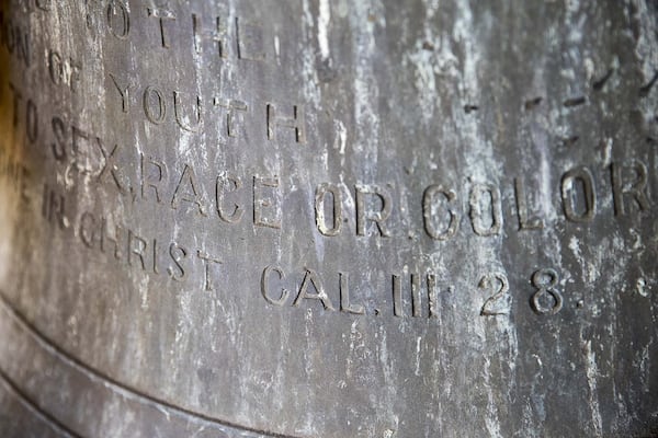 Words are etched into the bell that sits in the clocktower of the Historic Fountain Hall on the campus of Morris Brown College, Thursday, December 5, 2019. (ALYSSA POINTER/ALYSSA.POINTER@AJC.COM)