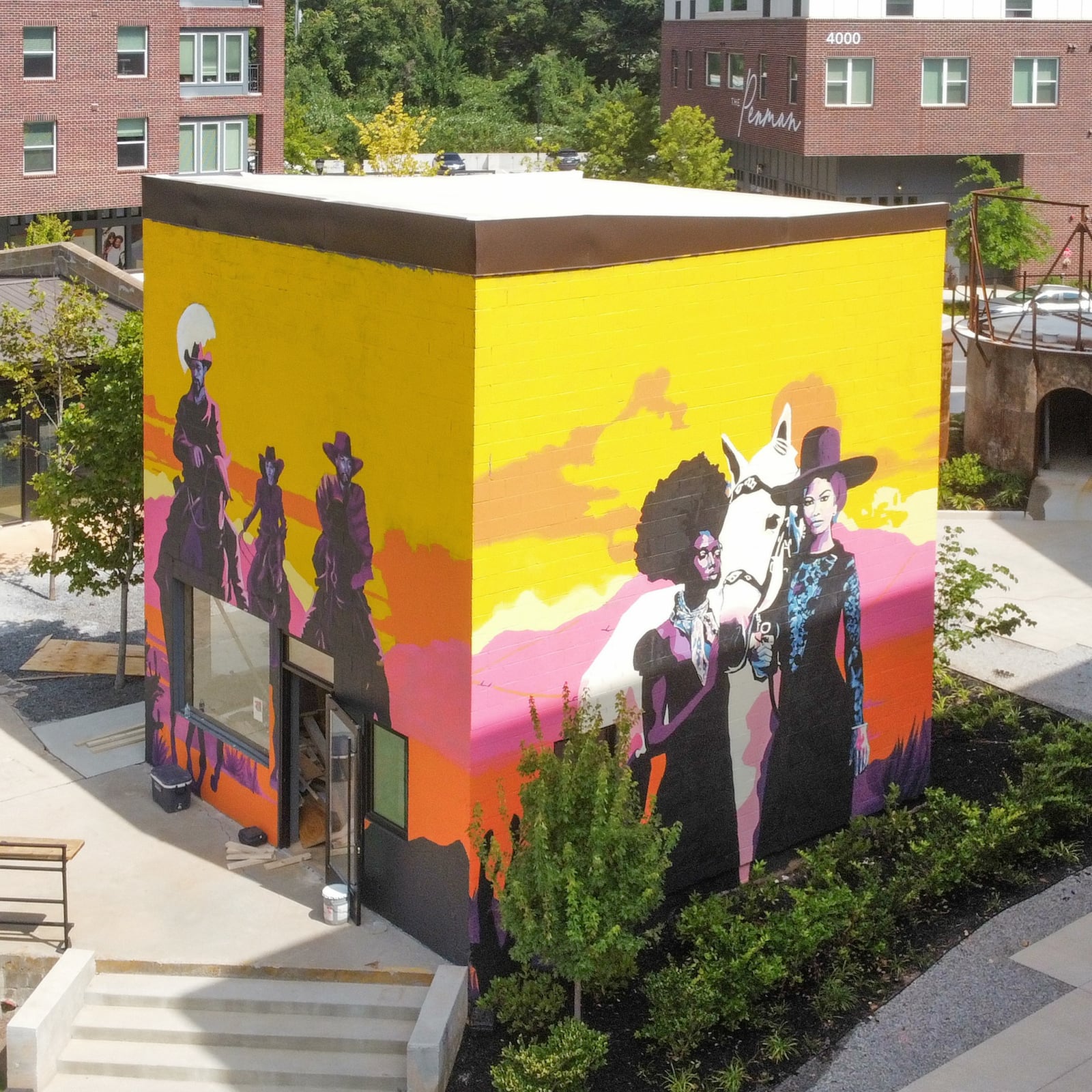 The full view of Aziza Andre's mural, “Renascent.”