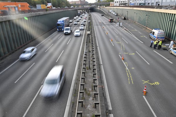 An Iraqi-born man deliberately drove his car into motorcycles along a stretch of Berlin highway, leaving at least one person in life-threatening condition in what German officials said Wednesday was a terror attack.